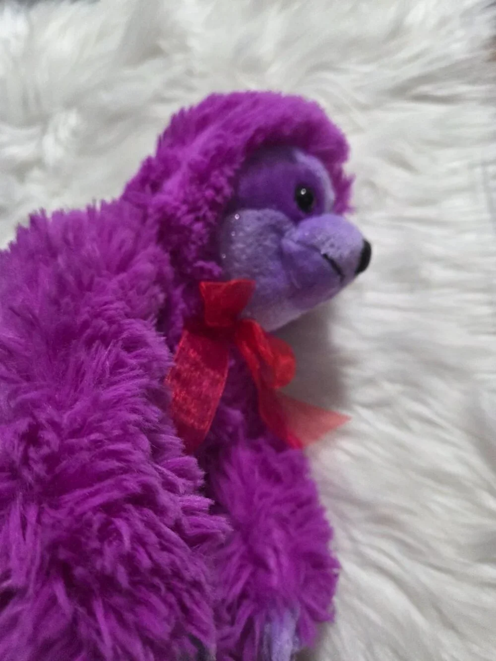 Purple Stuffed Sloth Toy